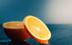 Нарезанный апельсин - скачать обои на рабочий стол