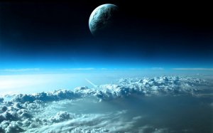 Планета над облаками - скачать обои на рабочий стол