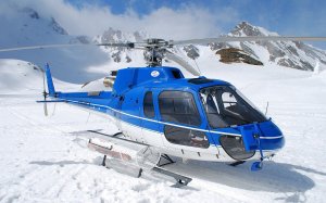 Вертолет еврокоптер в горах - скачать обои на рабочий стол